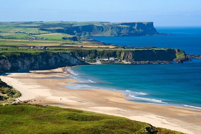 Chauffeur Giants Causeway & Belfast Private Day Tour From Dublin - Dunluce Castle photo stop: a quick finale on the coastline