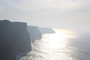 Cliffs of Moher including Cliffs of Moher Boat Experience Luxury Car Tour - Doolin ferry boat ride: sea-level views with real wave energy