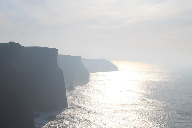 Cliffs of Moher including Cliffs of Moher Boat Experience Luxury Car Tour - Doolin ferry boat ride: sea-level views with real wave energy