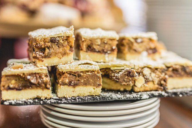 Dublin Historical Centre Food Tour with 8 Food Tastings & Drinks - Stop 2: 8 Essex St W bakery comfort—sausage rolls plus a secret dish